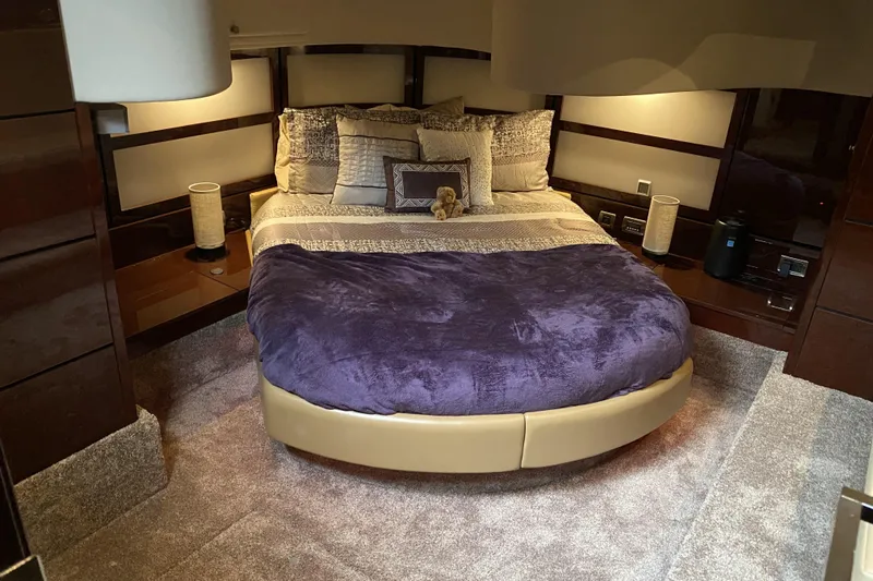 Cheri Pie Yacht Photos Pics Luxurious bedroom interior of 2008 Sea Ray 47 Sedan Bridge yacht with plush bedding.