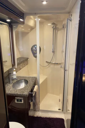 Cheri Pie Yacht Photos Pics Luxurious bathroom in 2008 Sea Ray 47 Sedan Bridge yacht with modern fixtures.