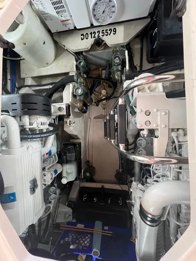 Cheri Pie Yacht Photos Pics Engine room of 2008 Sea Ray 47 Sedan Bridge, showcasing mechanical components and systems.
