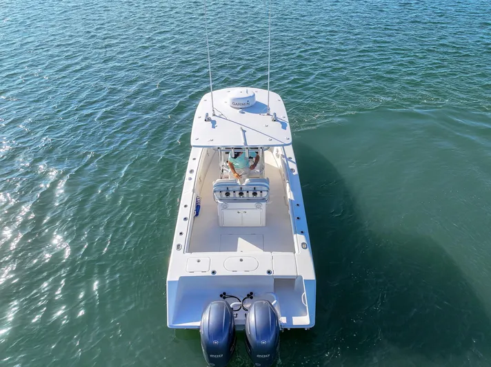  Yacht Photos Pics Aerial view of 2018 Jupiter 26 FS boat on open water.
