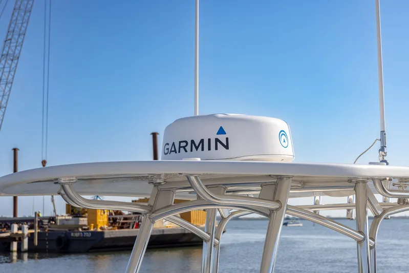 Yacht Photos Pics Garmin radar on 2018 Jupiter 26 FS boat, docked by the water.