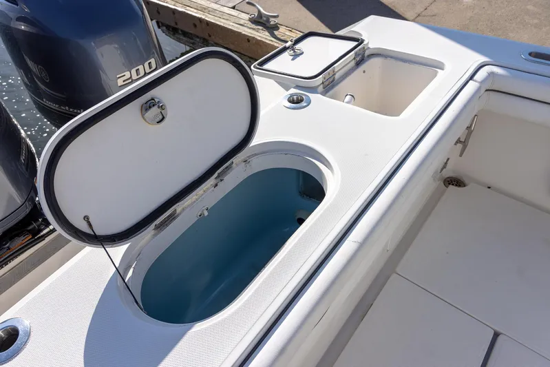  Yacht Photos Pics Open livewell on 2018 Jupiter 26 FS boat with dual 200 horsepower engines.