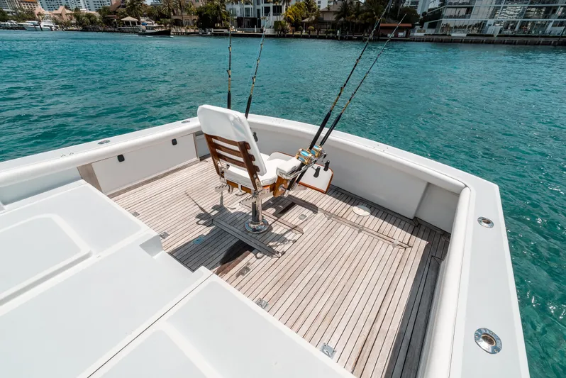 Shannon Yacht Photos Pics 1973 Striker 34 Canyon Runner fishing boat with rod holders on a sunny day.