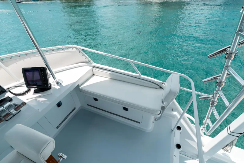 Shannon Yacht Photos Pics 1973 Striker 34 Canyon Runner boat deck with seating, overlooking clear blue water.