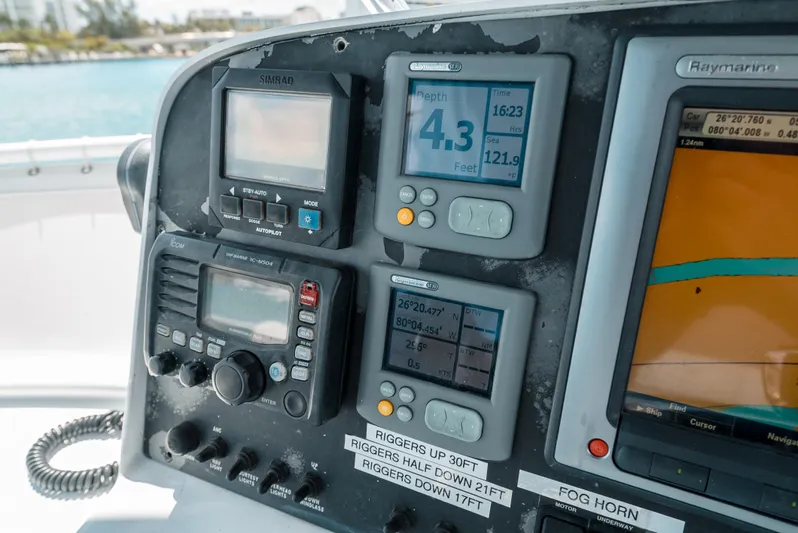 Shannon Yacht Photos Pics Control panel of a 1973 Striker 34 Canyon Runner boat with navigation instruments.