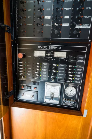 Shannon Yacht Photos Pics Electrical panel of a 1973 Striker 34 Canyon Runner boat, featuring 12VDC service controls.