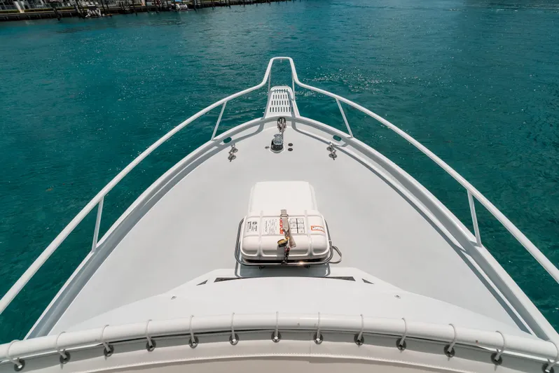 Shannon Yacht Photos Pics Bow view of 1973 Striker 34 Canyon Runner yacht on clear blue water.