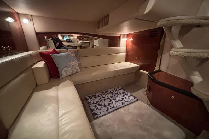 Dulce Vita Yacht Photos Pics Interior of 2003 Sea Ray 340 Sundancer yacht with cozy seating and elegant decor.