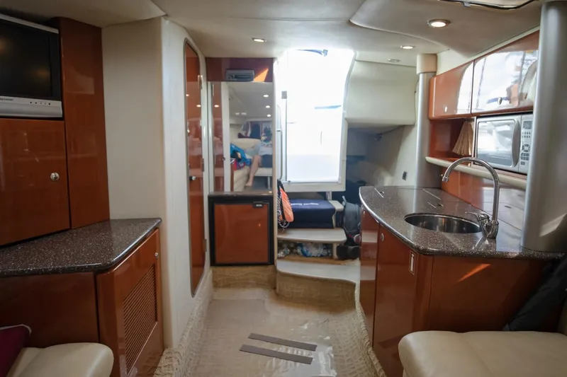  Yacht Photos Pics Luxurious interior of a 2007 Formula 370 Super Sport yacht with modern amenities.