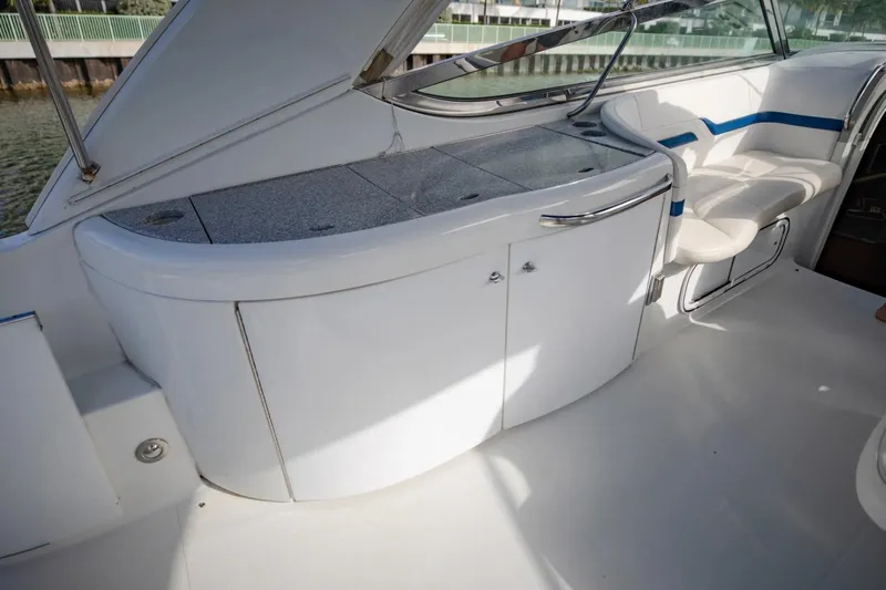  Yacht Photos Pics 2007 Formula 370 Super Sport yacht interior with sleek white cabinetry and seating.