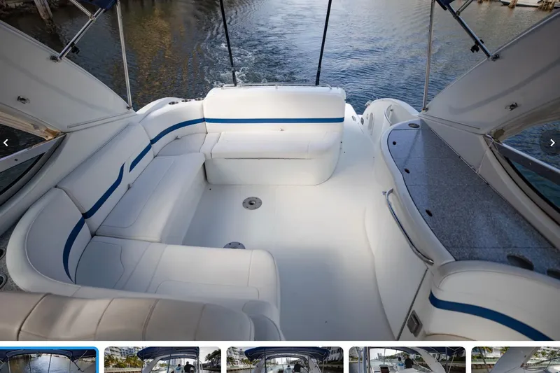  Yacht Photos Pics 2007 Formula 370 Super Sport boat interior with white seating and blue accents.