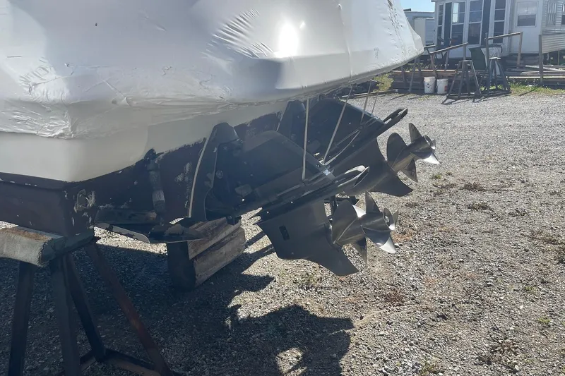  Yacht Photos Pics 2007 Formula 370 Super Sport boat with dual propellers on a gravel surface.