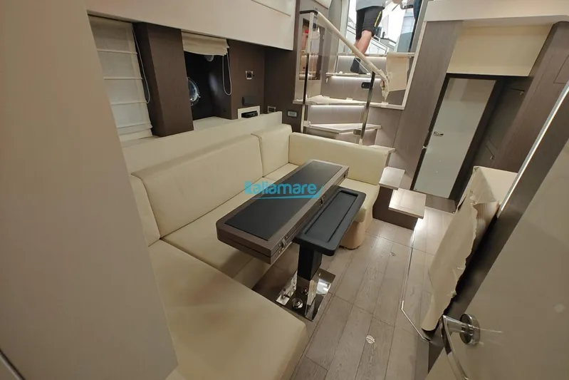 Yacht Photos Pics Luxurious interior of 2018 Cranchi 60 ST yacht with modern seating and elegant design.