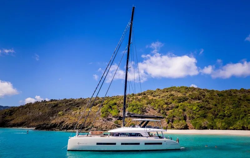 Aeolus 77 Yacht Photos Pics At anchor at an unknown Caribbean beach...