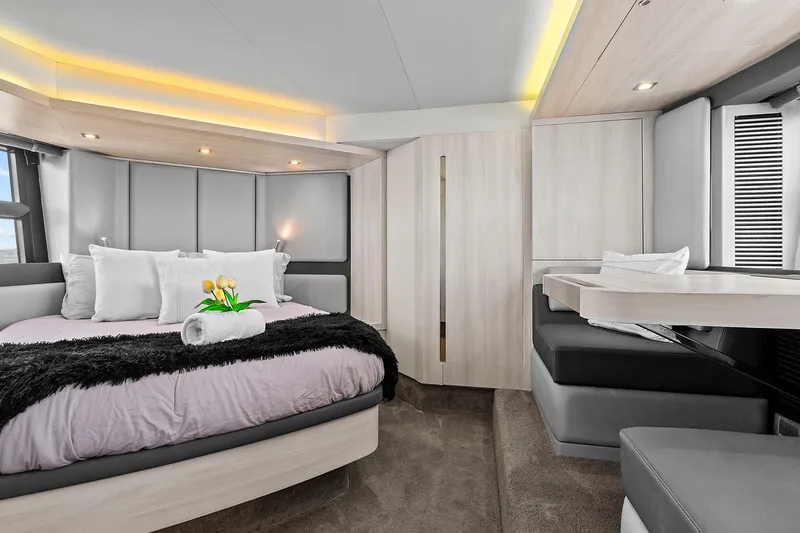 Lithium Yacht Photos Pics Luxurious bedroom interior of 2015 Azimut 55S yacht with modern design and elegant decor.