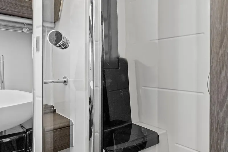 Lithium Yacht Photos Pics Modern bathroom interior of 2015 Azimut 55S yacht with sleek shower design.