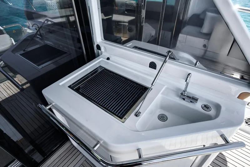 Lithium Yacht Photos Pics Outdoor sink and grill on 2015 Azimut 55S yacht deck.