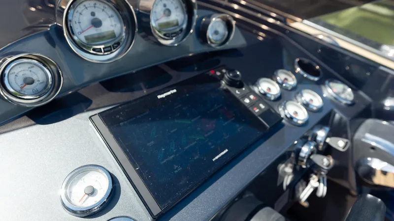 1017gt2017 Yacht Photos Pics Dashboard of 2017 Frauscher 1017 GT boat with gauges and navigation screen.