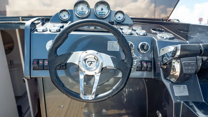 1017gt2017 Yacht Photos Pics Steering wheel and dashboard of 2017 Frauscher 1017 GT boat.