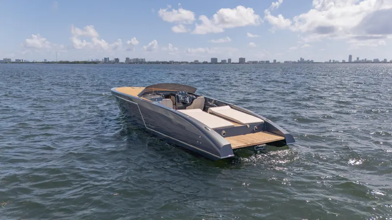 1017gt2017 Yacht Photos Pics 2017 Frauscher 1017 GT luxury boat on open water under a clear sky.