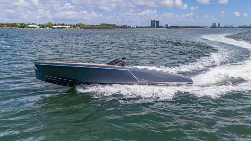 1017gt2017 Yacht Photos Pics 2017 Frauscher 1017 GT cruising on open water under a clear sky.