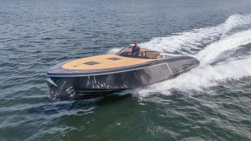 1017gt2017 Yacht Photos Pics 2017 Frauscher 1017 GT luxury motorboat cruising on open water.