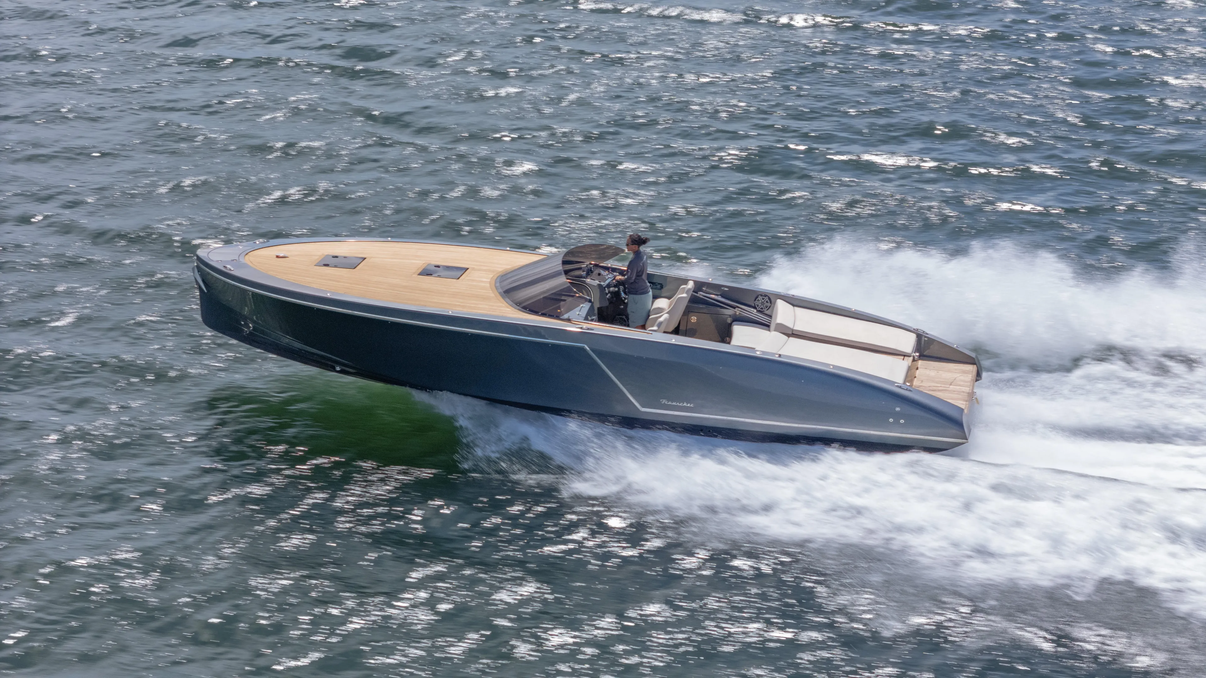 1017gt2017 Yacht Photos Pics 2017 Frauscher 1017 GT speedboat cruising on open water.