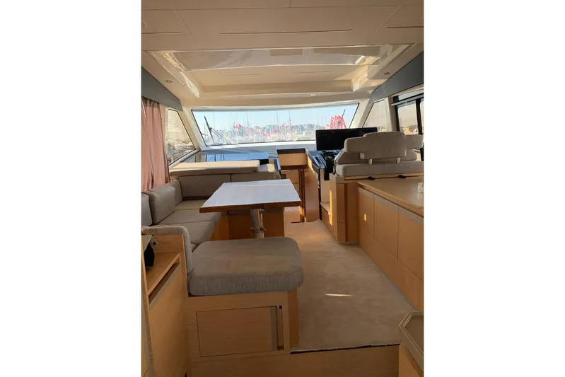  Yacht Photos Pics Interior of 2022 Greenline 45 Coupe yacht with modern seating and helm.