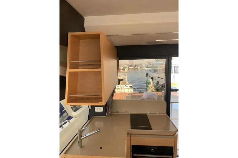  Yacht Photos Pics Interior of 2022 Greenline 45 Coupe yacht with modern kitchen and marina view.