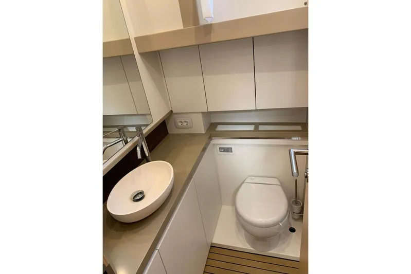  Yacht Photos Pics Modern bathroom in 2022 Greenline 45 Coupe yacht with sleek fixtures and compact design.