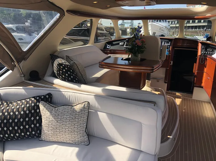  Yacht Photos Pics Luxurious interior of a 2012 Zeelander Z44 yacht with elegant seating and decor.