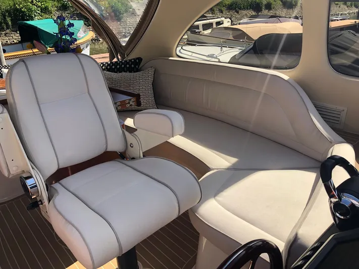  Yacht Photos Pics Luxurious interior of 2012 Zeelander Z44 yacht with plush seating and elegant design.