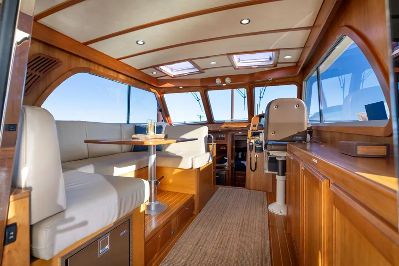 Jackson Yacht Photos Pics Luxurious interior of 2013 Sabre 38 Salon Express yacht with elegant wood finish.