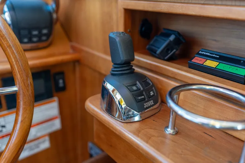 Jackson Yacht Photos Pics 2013 Sabre 38 Salon Express helm with joystick control and wooden steering wheel.