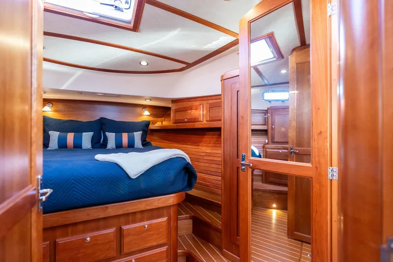 Jackson Yacht Photos Pics Luxurious interior of 2013 Sabre 38 Salon Express yacht cabin with wooden finish.