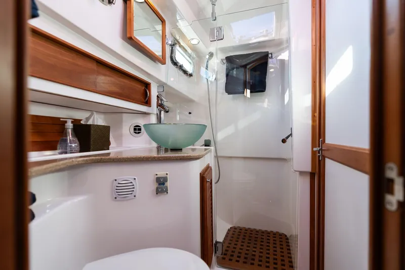 Jackson Yacht Photos Pics Luxurious bathroom in 2013 Sabre 38 Salon Express yacht with modern fixtures.