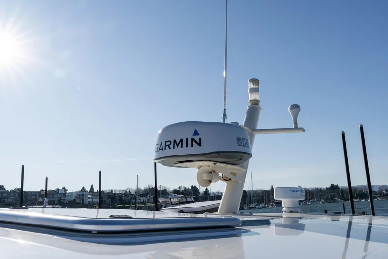 Jackson Yacht Photos Pics 2013 Sabre 38 Salon Express with Garmin radar under clear blue sky.