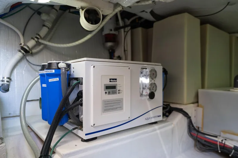 Jackson Yacht Photos Pics Engine room of 2013 Sabre 38 Salon Express with water filtration system.