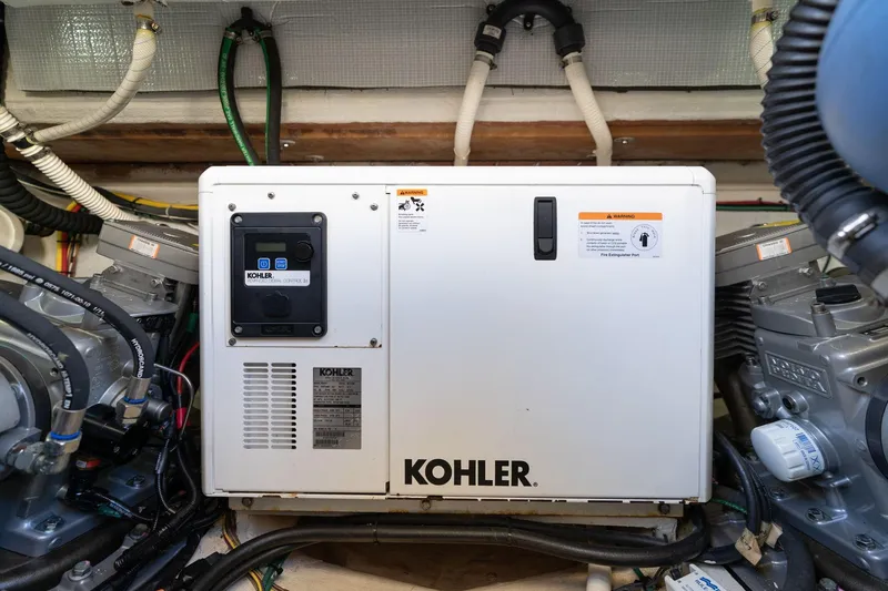 Jackson Yacht Photos Pics Engine room of 2013 Sabre 38 Salon Express with Kohler generator.