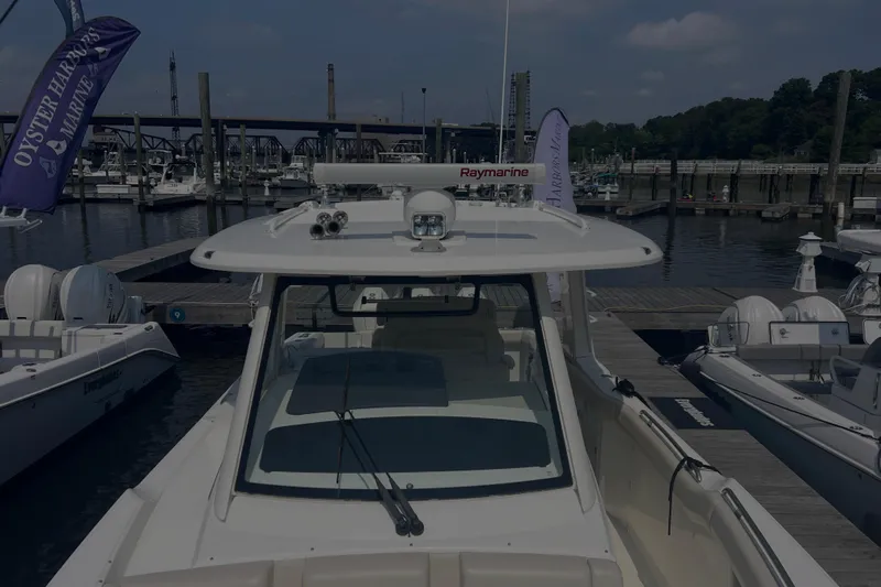  Yacht Photos Pics 2020 Boston Whaler 350 Realm docked at marina with Raymarine equipment.