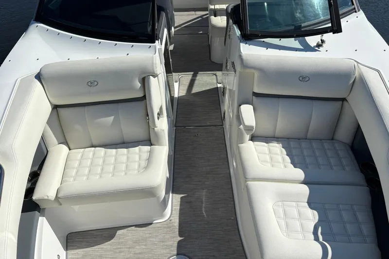  Yacht Photos Pics 2022 Cobalt 30SC boat interior with luxurious white seating and modern design.
