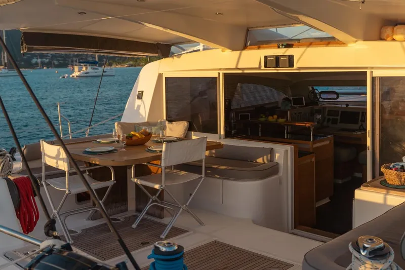 Hera Yacht Photos Pics Catana 50 yacht interior, 2008 model, featuring a dining area with ocean view.