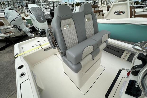 2024 Avenger AV26 boat with dual gray seats and modern design.
