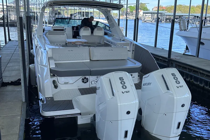  Yacht Photos Pics 2023 Sea Ray SLX 400 OB boat with twin Mercury 600 V12 engines docked.