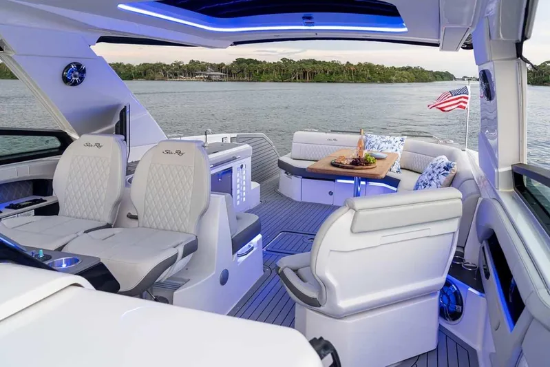  Yacht Photos Pics 2023 Sea Ray SLX 400 OB luxury boat interior with plush seating and scenic water view.