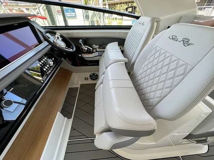  Yacht Photos Pics 2023 Sea Ray SLX 400 OB interior with luxurious seating and modern dashboard.