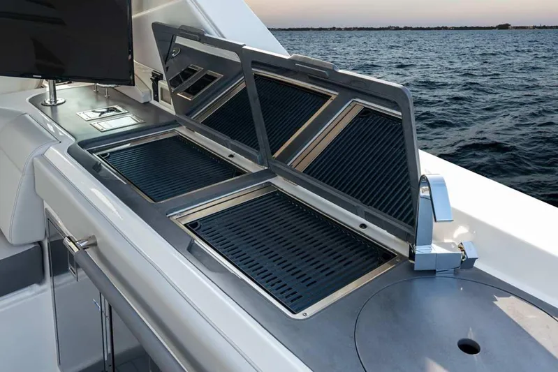  Yacht Photos Pics 2023 Sea Ray SLX 400 OB boat with outdoor grill and ocean view.