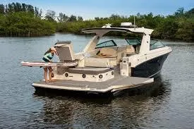  Yacht Photos Pics 2023 Sea Ray SLX 400 OB boat on water, featuring spacious deck and modern design.