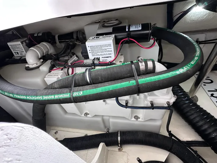  Yacht Photos Pics Engine compartment of 2023 Sea Ray SLX 400 OB with visible hoses and wiring.