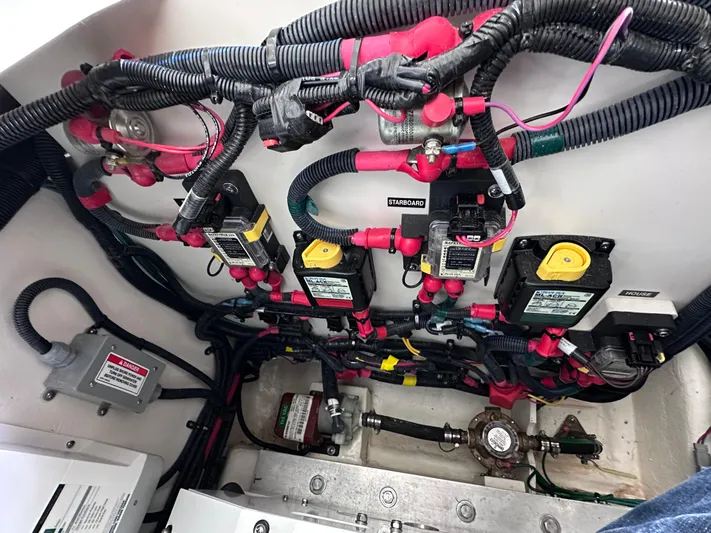  Yacht Photos Pics Engine compartment wiring of 2023 Sea Ray SLX 400 OB boat, showcasing electrical components and connections.